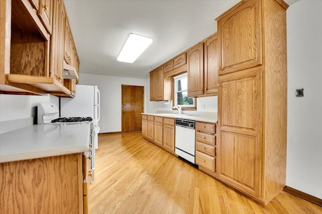 901 E Ardyce Ln, Mount Prospect, IL 60056 - kitchen with white appliances, under cabinet range hood, light wood finished floors, and light countertops