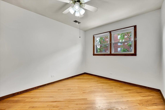 901 E Ardyce Ln, Mount Prospect, IL 60056 - unfurnished room featuring light wood-style flooring, a ceiling fan, and lofted ceiling