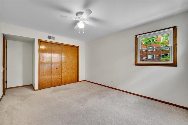 901 E Ardyce Ln, Mount Prospect, IL 60056 - unfurnished bedroom with carpet floors, a closet, and a ceiling fan
