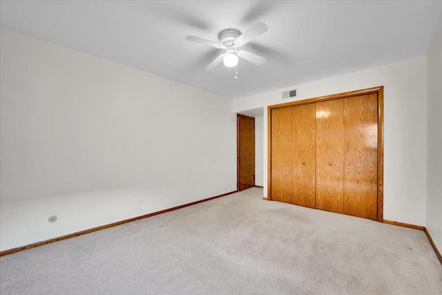 901 E Ardyce Ln, Mount Prospect, IL 60056 - unfurnished bedroom with carpet, a closet, and ceiling fan