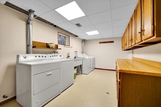 901 E Ardyce Ln, Mount Prospect, IL 60056 - laundry area with washing machine and dryer and cabinet space