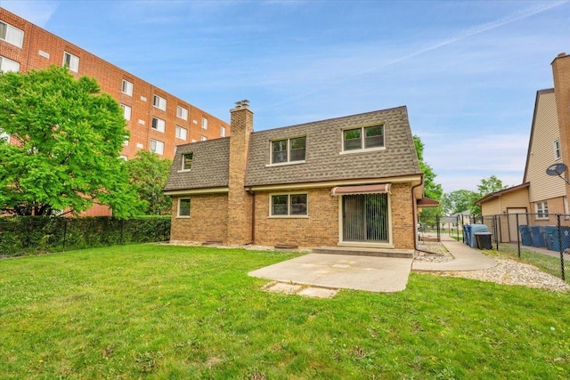 901 E Ardyce Ln, Mount Prospect, IL 60056 - back of property featuring roof with shingles, mansard roof, brick siding, a patio area, and a chimney