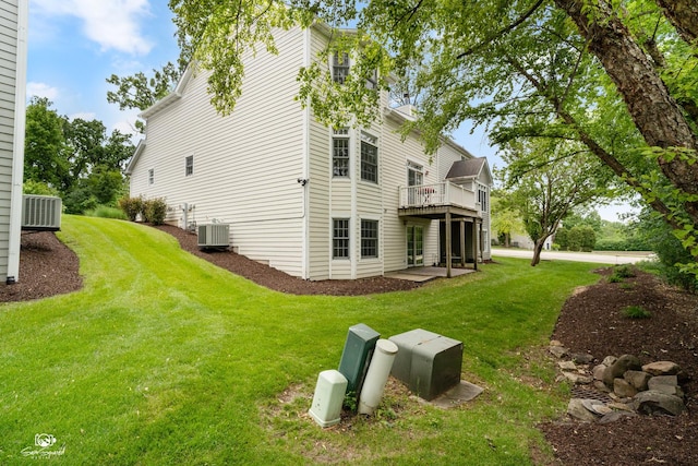 2508 Reflections Dr, Crest Hill, IL 60403 - view of side of property with a yard, central AC, and a wooden deck