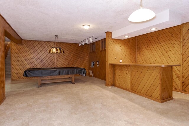 212 Mays Dr, Bloomington, IL 61701 - unfurnished room featuring wood walls, billiards, and track lighting
