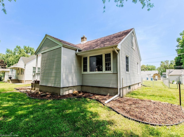 444 S Tanner Ave, Kankakee, IL 60901 - unfurnished living room featuring wood finished floors