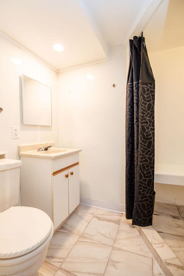 444 S Tanner Ave, Kankakee, IL 60901 - bathroom with marble finish floors, vanity, and curtained shower