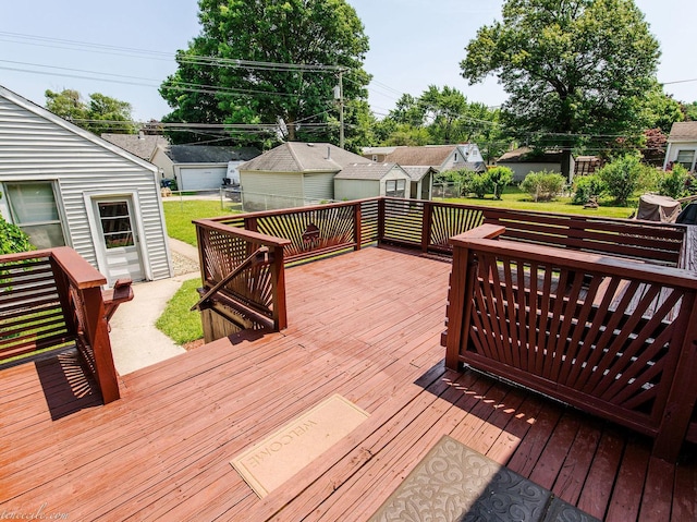 444 S Tanner Ave, Kankakee, IL 60901 - wooden deck with a lawn