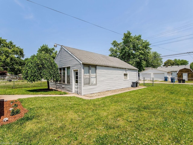 444 S Tanner Ave, Kankakee, IL 60901 - view of home's exterior featuring a detached garage