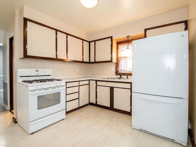 444 S Tanner Ave, Kankakee, IL 60901 - kitchen featuring gas range gas stove, light wood-type flooring, and light countertops