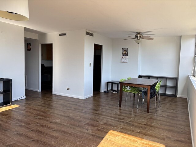 6301 N Sheridan Rd Unit 5H, Chicago, IL 60660 - dining space featuring a ceiling fan and dark wood-style flooring