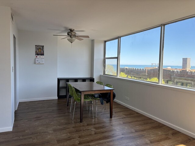 6301 N Sheridan Rd Unit 5H, Chicago, IL 60660 - dining space featuring a ceiling fan and dark wood finished floors