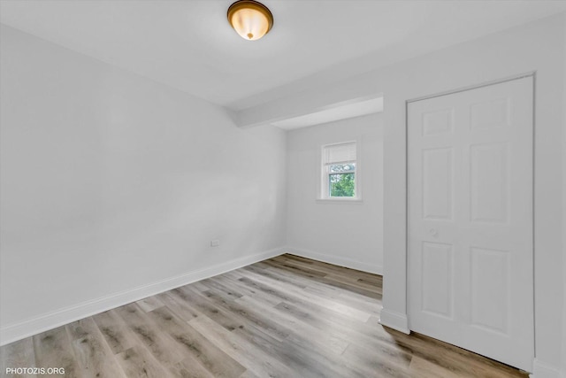 10002 S Torrence Ave, Chicago, IL 60617 - spare room with light wood-style floors and baseboards