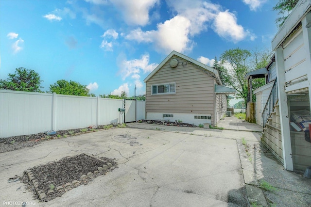10002 S Torrence Ave, Chicago, IL 60617 - rear view of house featuring a patio and crawl space