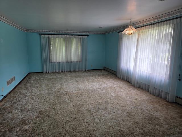 4247 W Church Rd, Beecher, IL 60401 - carpeted spare room with healthy amount of natural light and a baseboard radiator