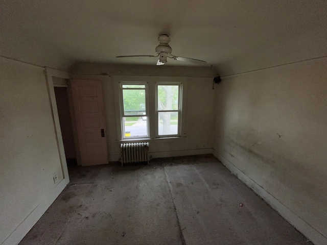 104 Interocean Ave, South Chicago Heights, IL 60411 - unfurnished room featuring radiator and ceiling fan