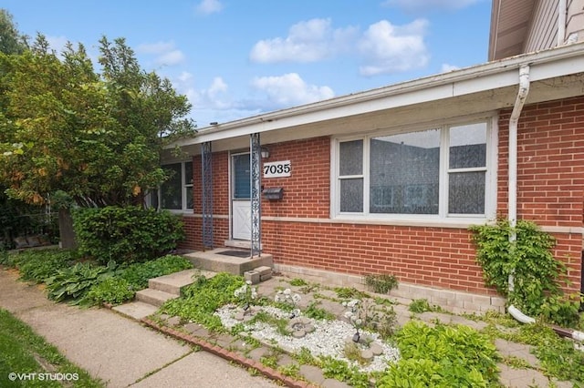 7035 W Greenleaf St, Niles, IL 60714 - view of exterior entry with brick siding