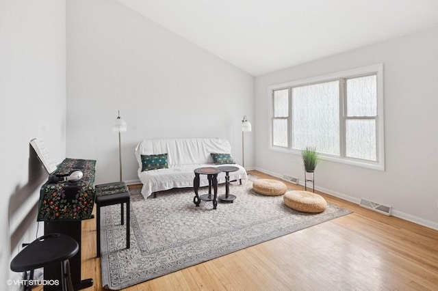 7035 W Greenleaf St, Niles, IL 60714 - bedroom with wood finished floors and lofted ceiling