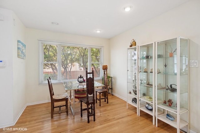 7035 W Greenleaf St, Niles, IL 60714 - dining room featuring light wood-style flooring and recessed lighting