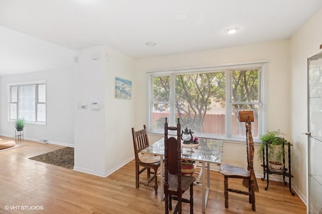 7035 W Greenleaf St, Niles, IL 60714 - dining area with plenty of natural light and light wood-style flooring