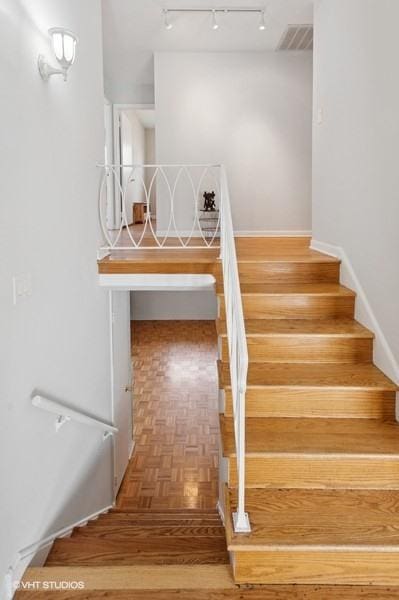 7035 W Greenleaf St, Niles, IL 60714 - stairs featuring track lighting