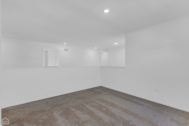 1214 Buckeye Cir, Crystal Lake, IL 60012 - spare room with recessed lighting, dark carpet, and baseboards