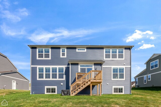 1214 Buckeye Cir, Crystal Lake, IL 60012 - rear view of house featuring a deck, stairway, and a yard