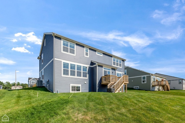 1214 Buckeye Cir, Crystal Lake, IL 60012 - rear view of house featuring a wooden deck, a lawn, central air condition unit, and stairs