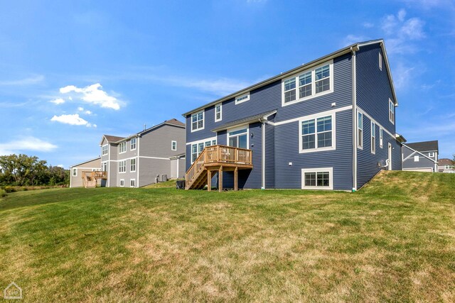 1214 Buckeye Cir, Crystal Lake, IL 60012 - rear view of property featuring a wooden deck, stairs, and a yard