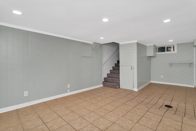 610 W S St, Plano, IL 60545 - finished below grade area with ornamental molding, stairway, recessed lighting, wooden walls, and tile patterned floors
