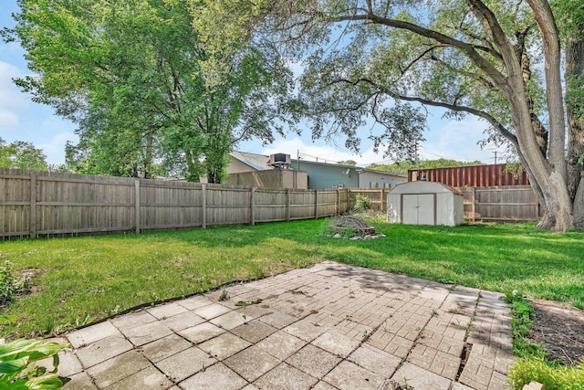 610 W S St, Plano, IL 60545 - fenced backyard featuring a patio and a shed