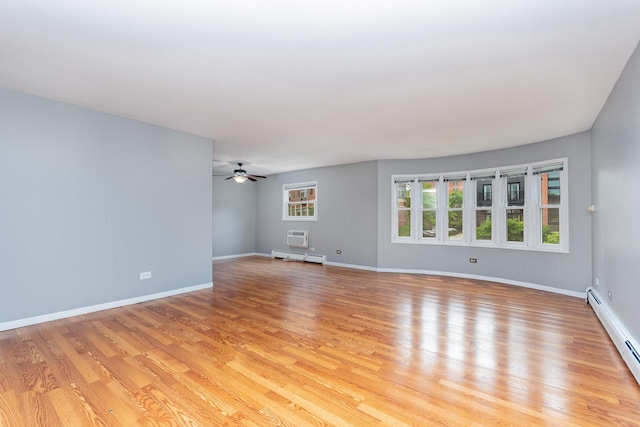 1130 Ontario St Unit B1, Oak Park, IL 60302 - unfurnished room with a baseboard radiator, light wood-style flooring, and baseboards