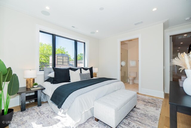 1812 N Howe St Unit Ph, Chicago, IL 60614 - bedroom featuring crown molding, wood finished floors, baseboards, recessed lighting, and ensuite bathroom