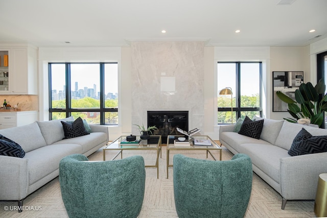 1812 N Howe St Unit Ph, Chicago, IL 60614 - living room with ornamental molding, a fireplace, recessed lighting, and a view of skyline