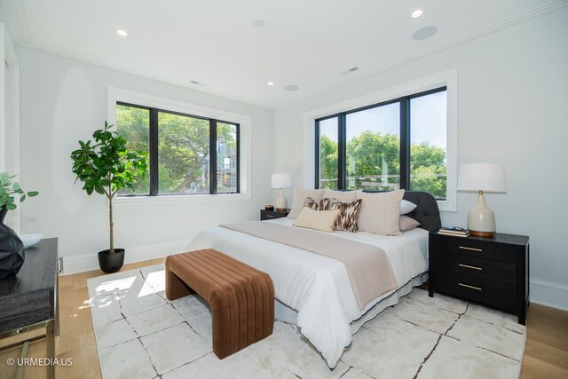 1812 N Howe St Unit Ph, Chicago, IL 60614 - bedroom featuring baseboards, light wood-style floors, recessed lighting, and crown molding