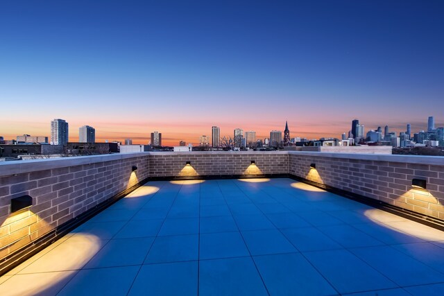 1812 N Howe St Unit Ph, Chicago, IL 60614 - view of swimming pool with a view of skyline and a patio
