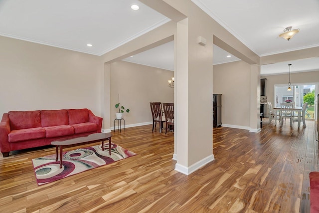 1221 Winding Way, Bolingbrook, IL 60490 - living room featuring wood finished floors, crown molding, recessed lighting, and a chandelier