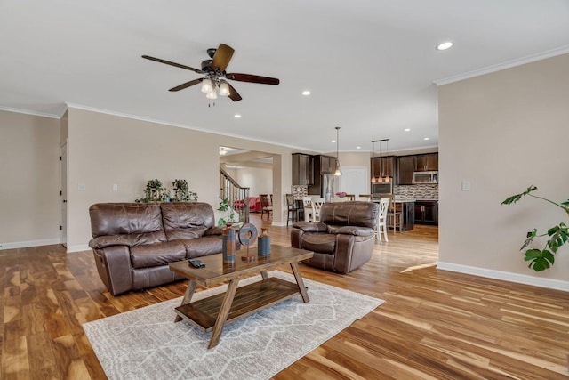 1221 Winding Way, Bolingbrook, IL 60490 - living area with stairs, light wood finished floors, ornamental molding, recessed lighting, and ceiling fan