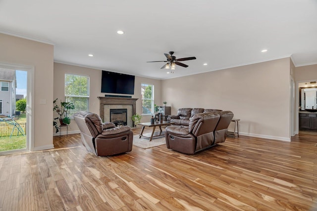 1221 Winding Way, Bolingbrook, IL 60490 - living area featuring a fireplace, light wood-style floors, ornamental molding, a ceiling fan, and recessed lighting