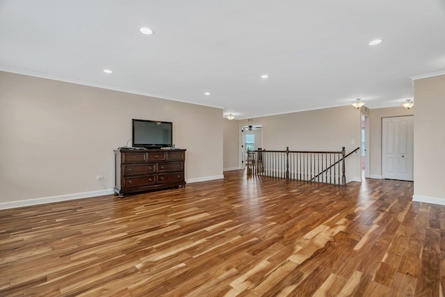 1221 Winding Way, Bolingbrook, IL 60490 - unfurnished living room with ornamental molding, wood finished floors, and recessed lighting