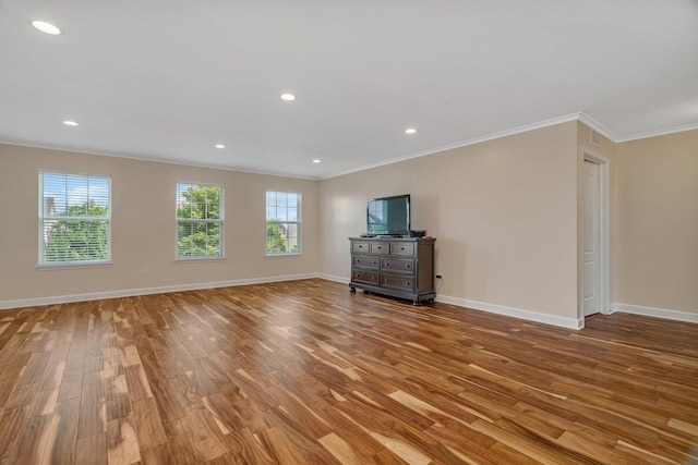 1221 Winding Way, Bolingbrook, IL 60490 - unfurnished living room with ornamental molding, wood finished floors, and recessed lighting