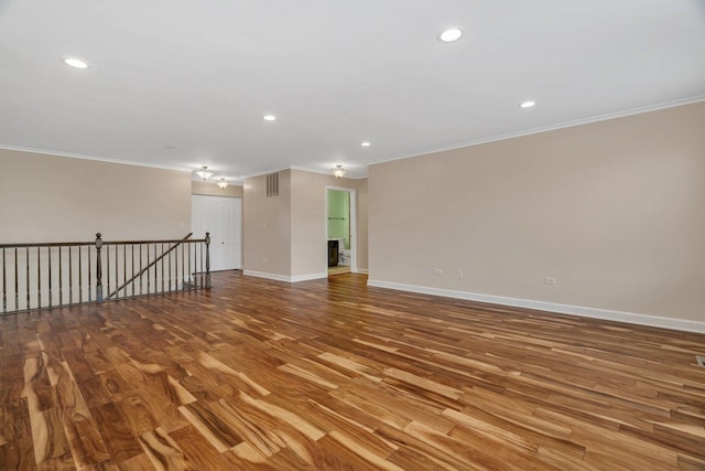 1221 Winding Way, Bolingbrook, IL 60490 - unfurnished room with wood finished floors, crown molding, and recessed lighting
