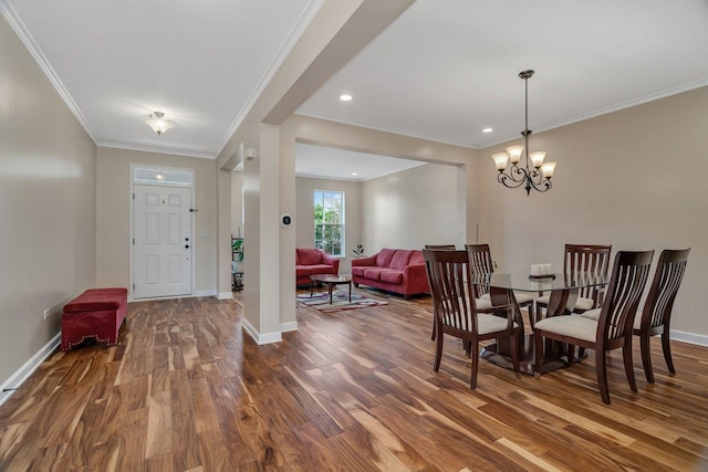 1221 Winding Way, Bolingbrook, IL 60490 - dining room featuring wood finished floors, ornamental molding, a chandelier, and recessed lighting