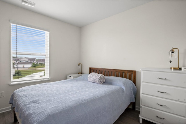 1025 Tuscany Trl, Hampshire, IL 60140 - bedroom with dark wood-style flooring and baseboards
