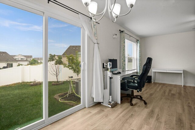 1025 Tuscany Trl, Hampshire, IL 60140 - home office with wood finished floors and a chandelier