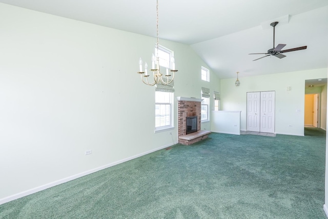 343 White Hawk Way, Manteno, IL 60950 - unfurnished living room with high vaulted ceiling, carpet, a brick fireplace, ceiling fan, and a chandelier