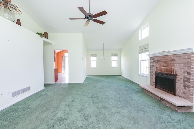 343 White Hawk Way, Manteno, IL 60950 - unfurnished living room with carpet floors, high vaulted ceiling, a fireplace, healthy amount of natural light, and a ceiling fan