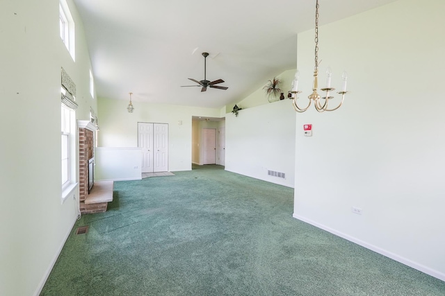 343 White Hawk Way, Manteno, IL 60950 - unfurnished living room featuring carpet floors, a ceiling fan, high vaulted ceiling, and a chandelier