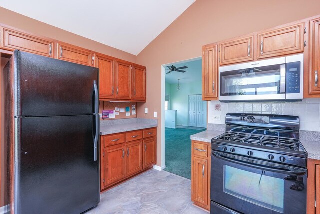 343 White Hawk Way, Manteno, IL 60950 - kitchen with black appliances, light countertops, brown cabinets, backsplash, and high vaulted ceiling