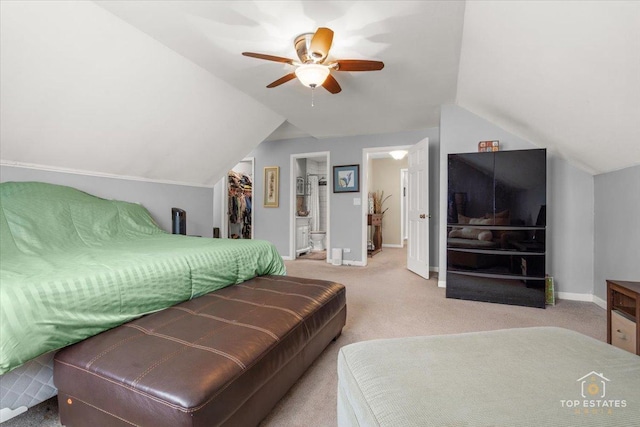 140 Amherst Dr, Bartlett, IL 60103 - carpeted bedroom with vaulted ceiling, a spacious closet, a closet, ensuite bath, and a ceiling fan
