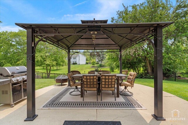 140 Amherst Dr, Bartlett, IL 60103 - fenced backyard with a gazebo and a patio